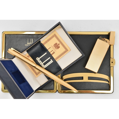 64 - THREE DUNHILL ITEMS, to include an engine turned Dunhill lighter, with maker's case and guarantee, a... 