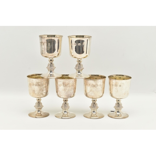 66 - A SET OF SIX ELIZABETH II SILVER GOBLETS, the bucket shaped bowl with gilt interior, on stem cast wi... 