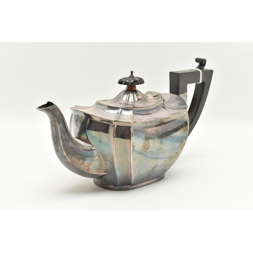 69 - A SILVER TEAPOT, faceted polished design fitted with an ebonised handle and finial, hallmarked Birmi... 