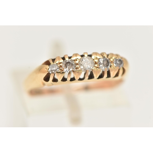 7 - A YELLOW METAL DIAMOND RING, set with five graduated diamonds, estimated total diamond weight 0.20ct... 