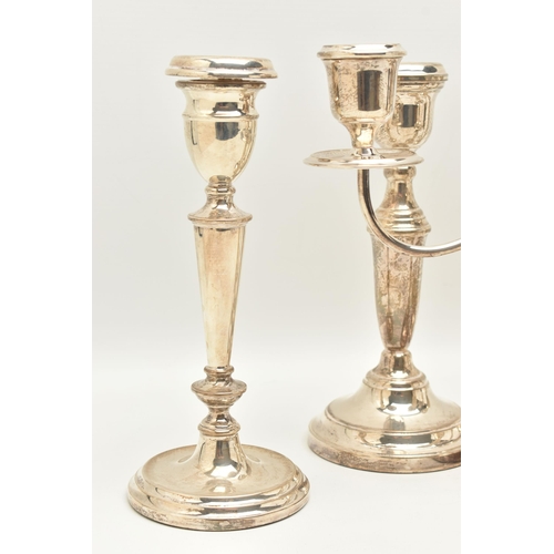 71 - TWO PAIRS OF ELIZABETH II SILVER CANDLESTICKS AND AN ELIZABETH II THREE LIGHT CANDELABRUM, all of a ... 