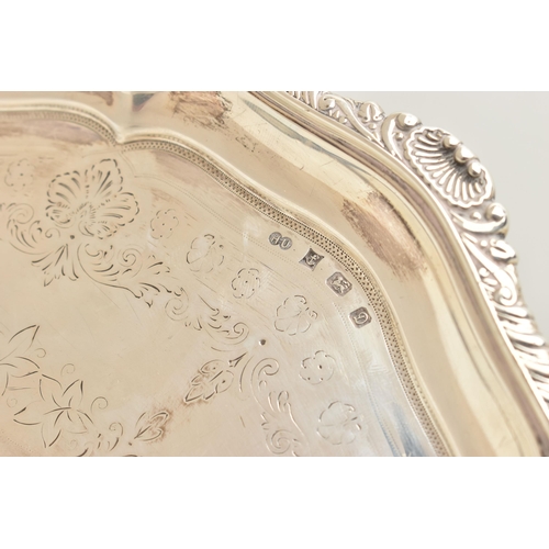 73 - AN EDWARDIAN ELKINGTON & CO SILVER SALVER, the gadrooned and shell cast rim with pie crust edge, the... 