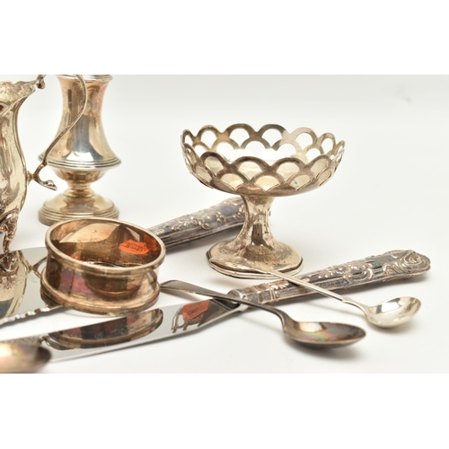 79 - ASSORTED SILVER ITEMS, to include a milk jug wavy rim, raised on four cabriole legs and scroll handl... 