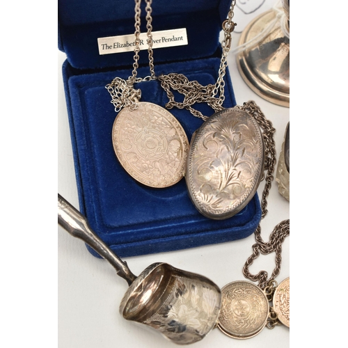 80 - A SELECTION OF SILVER AND WHITE METAL ITEMS, to include a Victorian oval locket, unmarked, a further... 