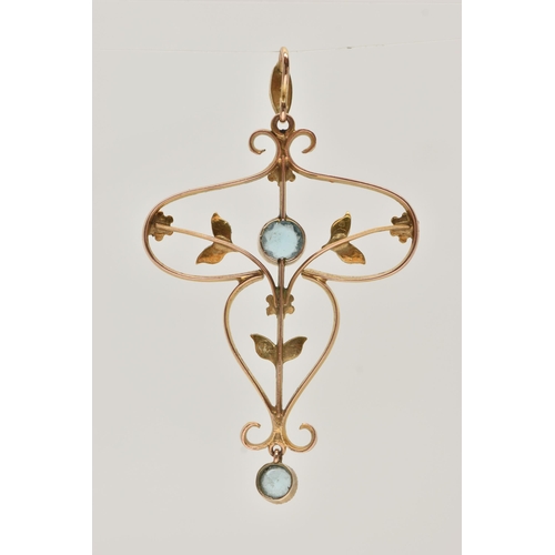 9 - A YELLOW METAL LAVALIER PENDANT, open work floral design, set with a central circular cut blue topaz... 