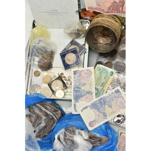 102 - A CARDBOARD BOX AND TIN CONTAINING MIXED COINS USED BANKNOTES AND COIN ALBUM, to include an Alderney... 