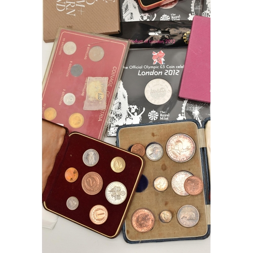 103 - A CARDBOARD BOX CONTAINING CASED COINS AND YEAR COIN SETS, to include UK 1977 1978, Austria Proofs 1... 