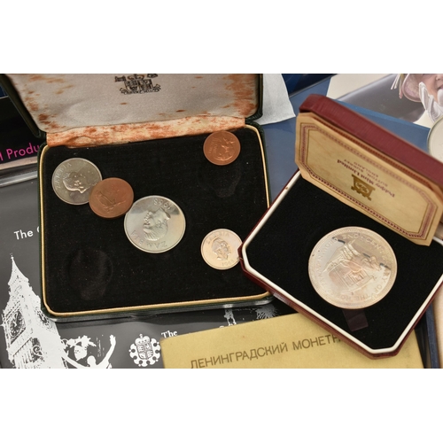 103 - A CARDBOARD BOX CONTAINING CASED COINS AND YEAR COIN SETS, to include UK 1977 1978, Austria Proofs 1... 