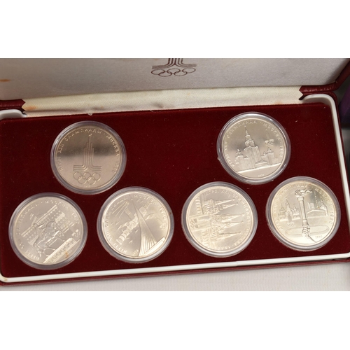 104 - A CARDBOARD BOX OF MIXED COINAGE, to include a cased Moscow 1980s Olympic coin set, a 1899 Victoria ... 