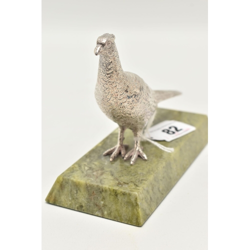 82 - AN ELIZABETH II SILVER PHEASANT, mounted on a green hardstone base, approximate base length 144mm x ... 