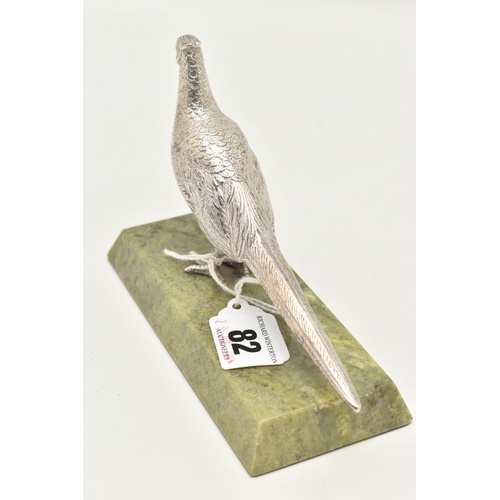 82 - AN ELIZABETH II SILVER PHEASANT, mounted on a green hardstone base, approximate base length 144mm x ... 