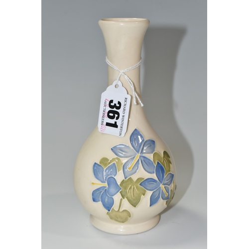 361 - A MOORCROFT POTTERY 'BLUE CAMPANULA' BUD VASE, tube lined with pale blue campanula flowers on a crea... 