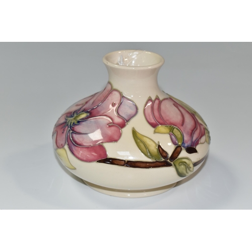 363 - A MOORCROFT POTTERY 'MAGNOLIA' PATTERN VASE, of squat bulbous form, tube lined with pink Magnolia fl... 