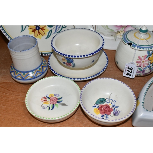 374 - A GROUP OF POOLE POTTERY, mainly traditional ware, comprising a Blue Cockerel plate, a grapefruit/ic... 