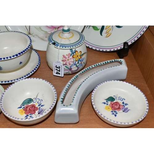 374 - A GROUP OF POOLE POTTERY, mainly traditional ware, comprising a Blue Cockerel plate, a grapefruit/ic... 