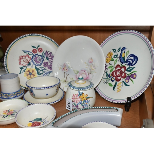 374 - A GROUP OF POOLE POTTERY, mainly traditional ware, comprising a Blue Cockerel plate, a grapefruit/ic... 