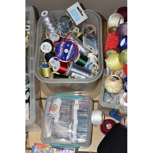 383 - FIVE SMALL PLASTIC STORAGE BOXES OF HABERDASHERY, to include a collection of unused coloured bead wi... 