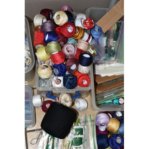 383 - FIVE SMALL PLASTIC STORAGE BOXES OF HABERDASHERY, to include a collection of unused coloured bead wi... 