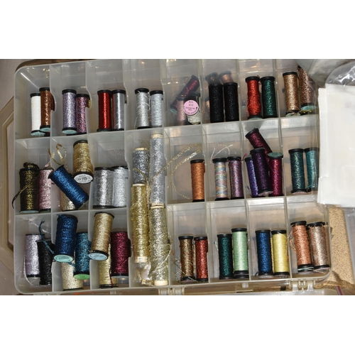 384 - THREE PLASTIC STORAGE BOXES OF QUILTING TEMPLATES AND REELS OF METALLIC THREAD, comprising two unuse... 