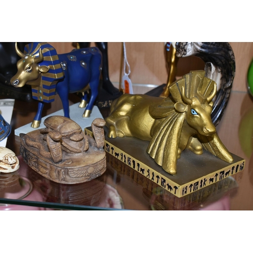 395 - A GROUP OF EGYPTIAN THEMED COLLECTABLES, comprising Cow Parade 'Tutancowmon' no 9126 and 'Egyptian P... 