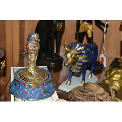 395 - A GROUP OF EGYPTIAN THEMED COLLECTABLES, comprising Cow Parade 'Tutancowmon' no 9126 and 'Egyptian P... 