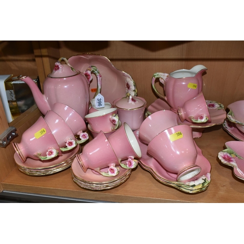 396 - THIRTY EIGHT PIECES OF ROYAL WINTON PINK 'PETUNIA' TEA AND DINNER WARES, comprising a coffee pot (co... 