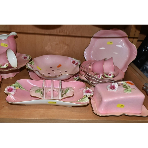 396 - THIRTY EIGHT PIECES OF ROYAL WINTON PINK 'PETUNIA' TEA AND DINNER WARES, comprising a coffee pot (co... 