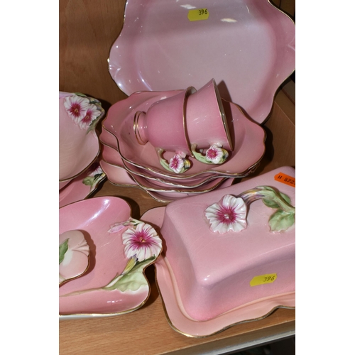 396 - THIRTY EIGHT PIECES OF ROYAL WINTON PINK 'PETUNIA' TEA AND DINNER WARES, comprising a coffee pot (co... 