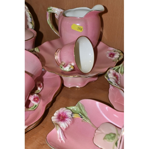 396 - THIRTY EIGHT PIECES OF ROYAL WINTON PINK 'PETUNIA' TEA AND DINNER WARES, comprising a coffee pot (co... 