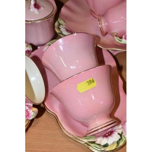 396 - THIRTY EIGHT PIECES OF ROYAL WINTON PINK 'PETUNIA' TEA AND DINNER WARES, comprising a coffee pot (co... 