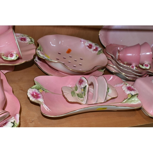 396 - THIRTY EIGHT PIECES OF ROYAL WINTON PINK 'PETUNIA' TEA AND DINNER WARES, comprising a coffee pot (co... 