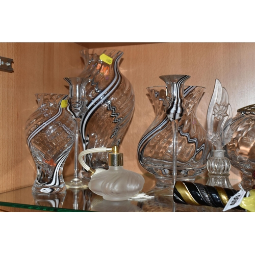 400 - A COLLECTION OF STUDIO GLASS, comprising a Dartington Crystal mantel clock, an amber glass Murano bu... 