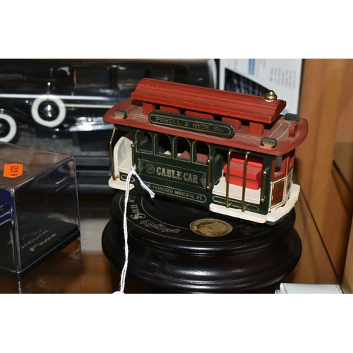 401 - TWO MODEL CARS AND CABLE CAR, comprising a model Jaguar F-Pace in a Perspex case, a Franklin Mint  d... 