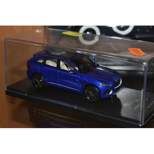 401 - TWO MODEL CARS AND CABLE CAR, comprising a model Jaguar F-Pace in a Perspex case, a Franklin Mint  d... 