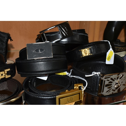 404 - A GROUP OF NINE GENTLEMENS DESIGNER LEATHER BELTS, black belts comprising maker's names Hugo Boss, D... 