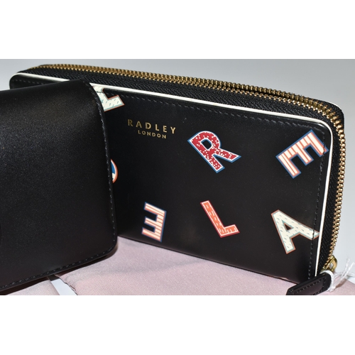 407 - TWO RADLEY PURSES WITH ORIGINAL DUST BAGS, each purse is black leather with iconic Radley design (2)... 