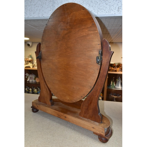 414 - A DRESSING TABLE 'OVAL' MIRROR, 58cm height x 46cm height, original manufacturers marks on brass hin... 