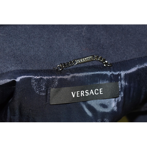 429 - VERSACE- FOUR LADIES VERSACE MID LENTH COATS, comprising a navy blue Gianni Versace pure wool coat w... 