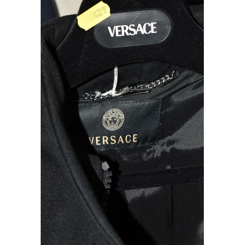 429 - VERSACE- FOUR LADIES VERSACE MID LENTH COATS, comprising a navy blue Gianni Versace pure wool coat w... 