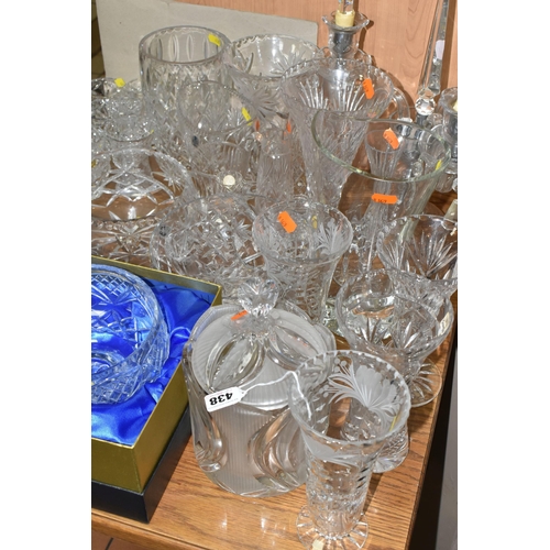 438 - A LARGE GROUP OF CRYSTAL CUT GLASSES to include a boxed Tutbury Crystal fruit bowl, a pair of etched... 