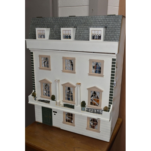 442 - A LARGE MODERN WOODEN DOLLS HOUSE MODELLED AS A TWO STOREY GEORGIAN TOWN HOUSE WITH ATTIC, fully fur... 