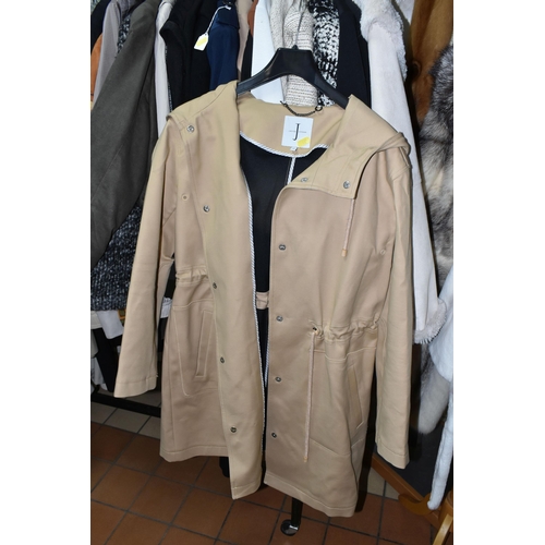 445 - A LARGE COLLECTION OF LADIES COATS, approximately 40 ladies coats sizes vary from 10,12,14 and 16, t... 