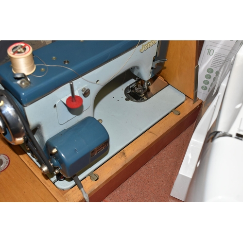 449 - THREE ELECTRIC SEWING MACHINES, included a vintage Jones heavy duty in a case, Singer Talent 3321 in... 