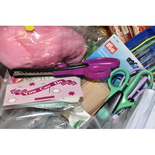 450 - FIVE BOXES OF CRAFTING SUPPLIES, included a large quantity of needle craft items, novelty buttons, s... 