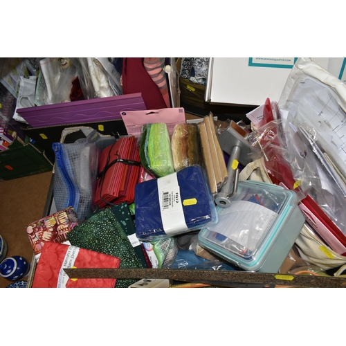 451 - FOUR BOXES OF CRAFT SUPPLIES, to include approximately 14 packs of fat quarters varies colours and p... 