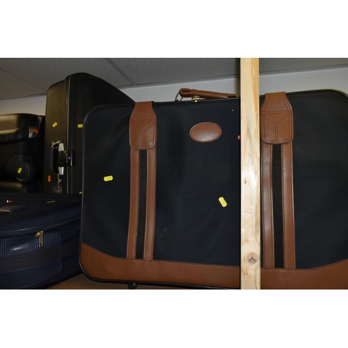 456 - A SELECTION OF SUITCASES VARIES SIZES, to include, five large black hard shell Samsonite cases measu... 