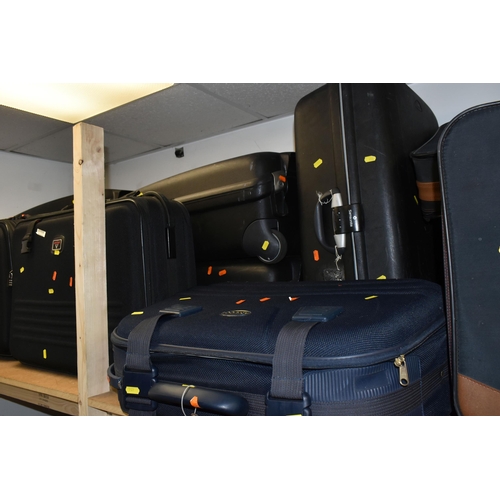 456 - A SELECTION OF SUITCASES VARIES SIZES, to include, five large black hard shell Samsonite cases measu... 