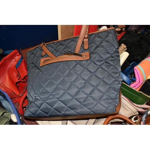 488 - THREE BOXES OF HAND BAGS, to include a large quantity of hand bags, maker's names include Clarks, F&... 