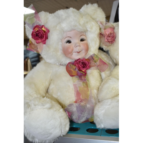 502 - FOUR LARGE WHITE SANDRA WILLIAM CREATION ANTHROPORMORPHIC DOLLS to include two Dutch Kissy dolls (in... 