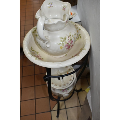 507 - A MODERN REPRODUCTION OF AN EARLY CERAMIC WASH STAND to include a wash basin and water jug, a soap d... 